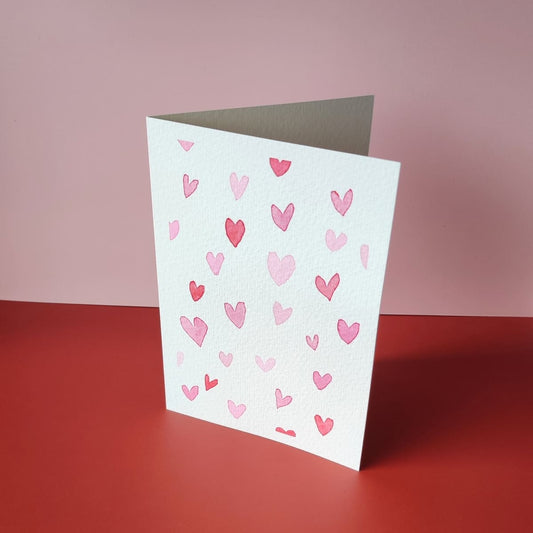 handgemalte Aquarell Karte mit roten pinken und rosa Herzen, Aquarellkarte Valentinstag Cozy Candles